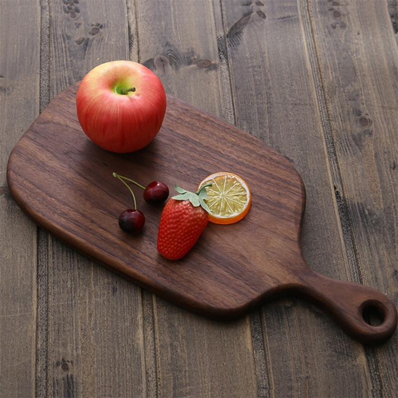 Black walnut cutting board with handle